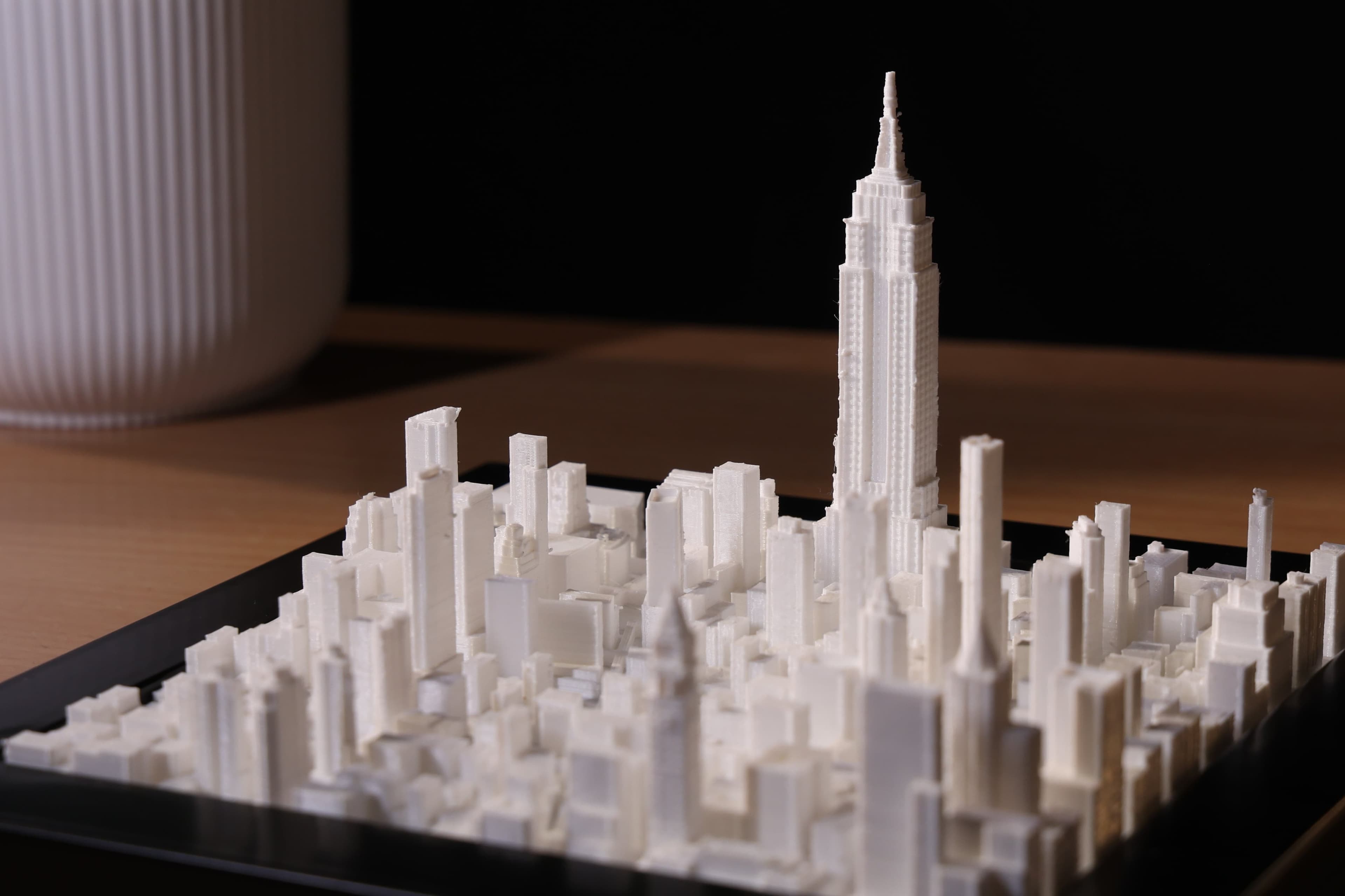 Close-up of a white 3D-printed skyline model